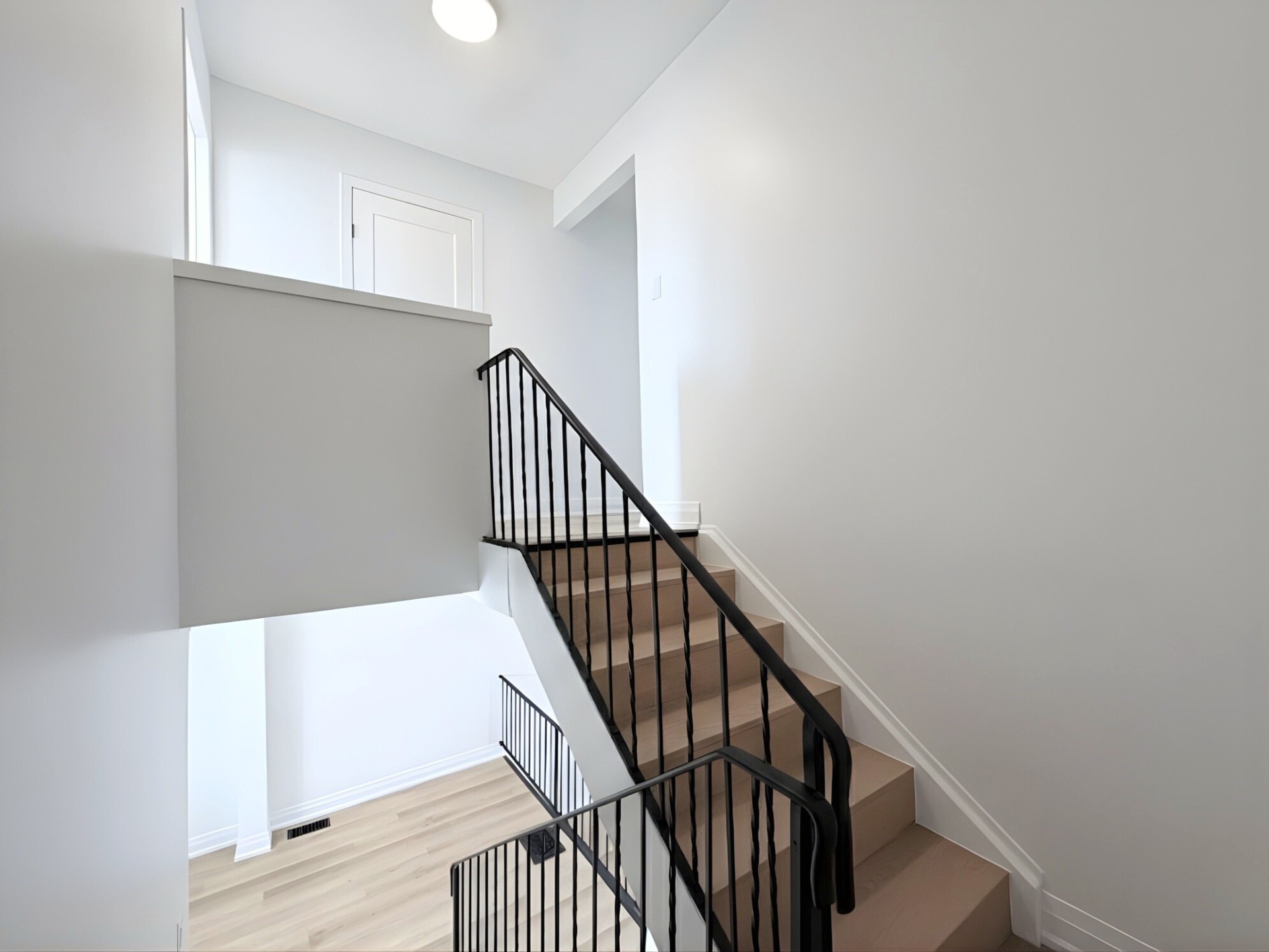 Wrought-iron staircase between floors