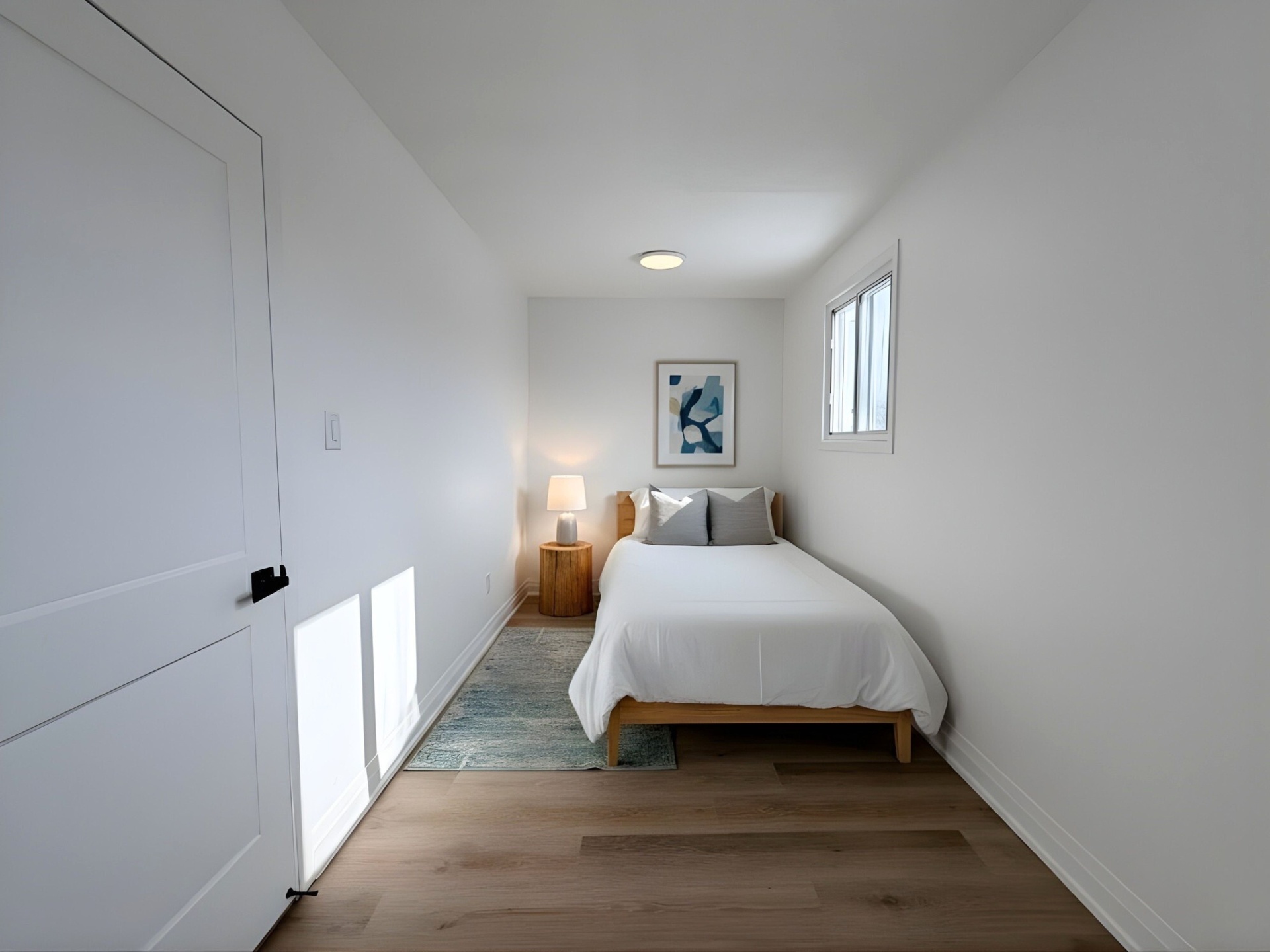 Cozy bedroom with art and warm lighting